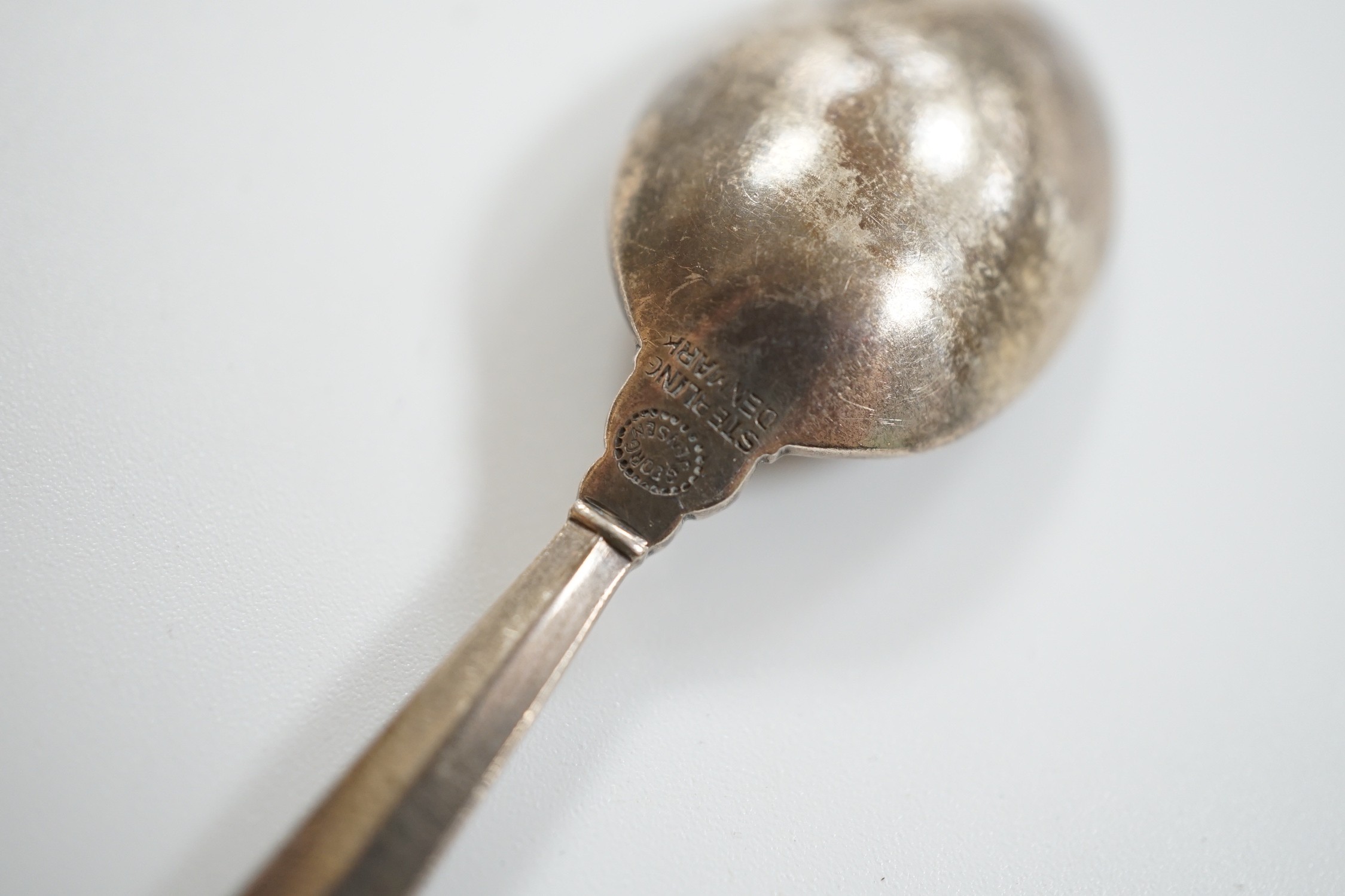 A set of nine 1950's Georg Jensen sterling coffee spoons, with London import marks and Georg Jensen box, 94mm, 93 grams.